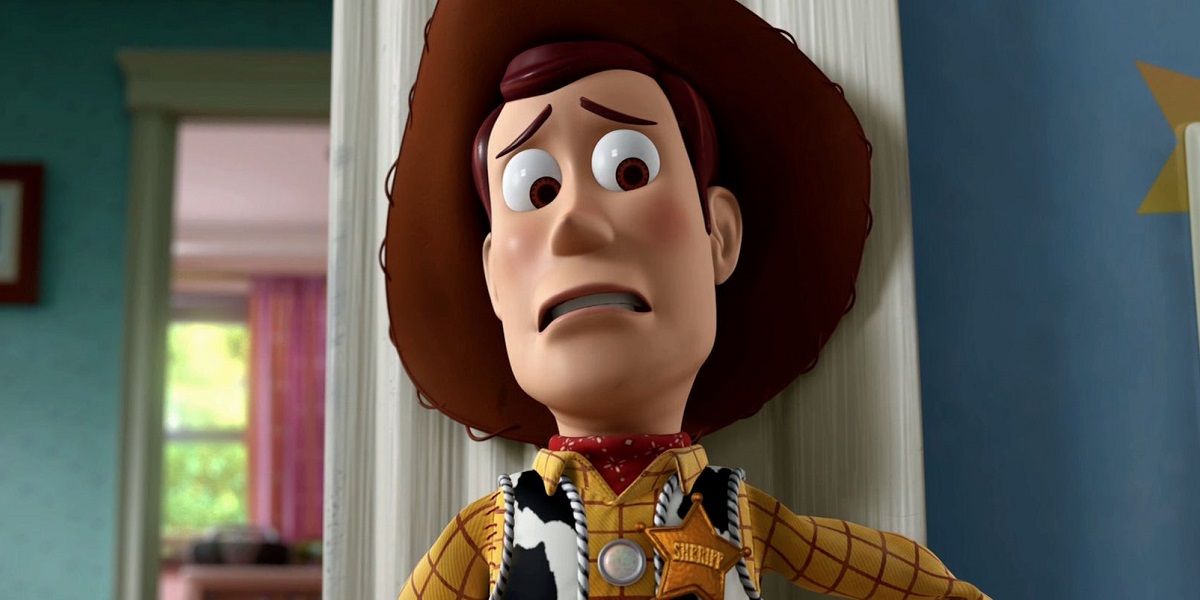 Woody hiding behind a wall in Toy Story