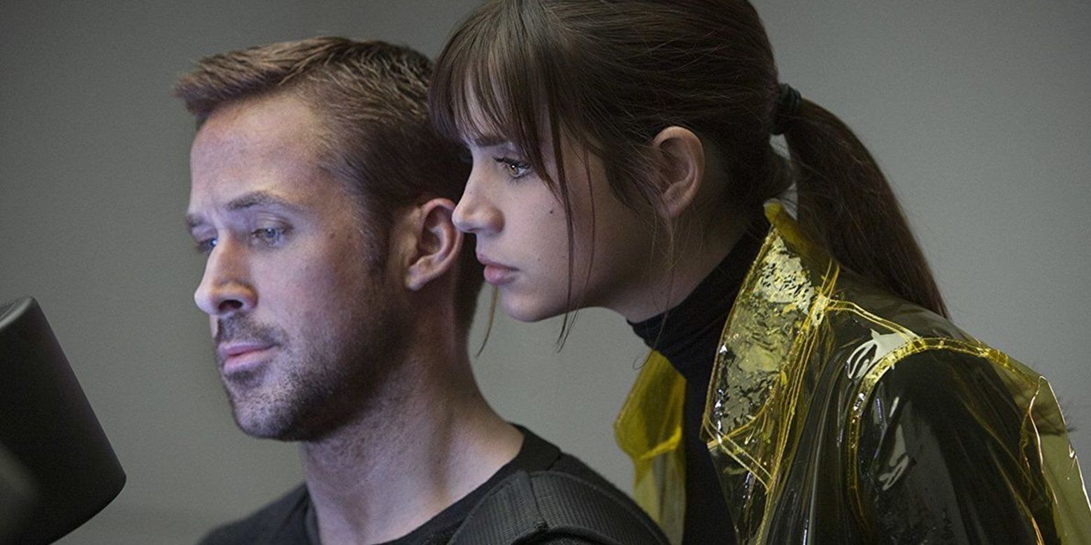 Joi leans over K's shoulder in Blade Runner 2049