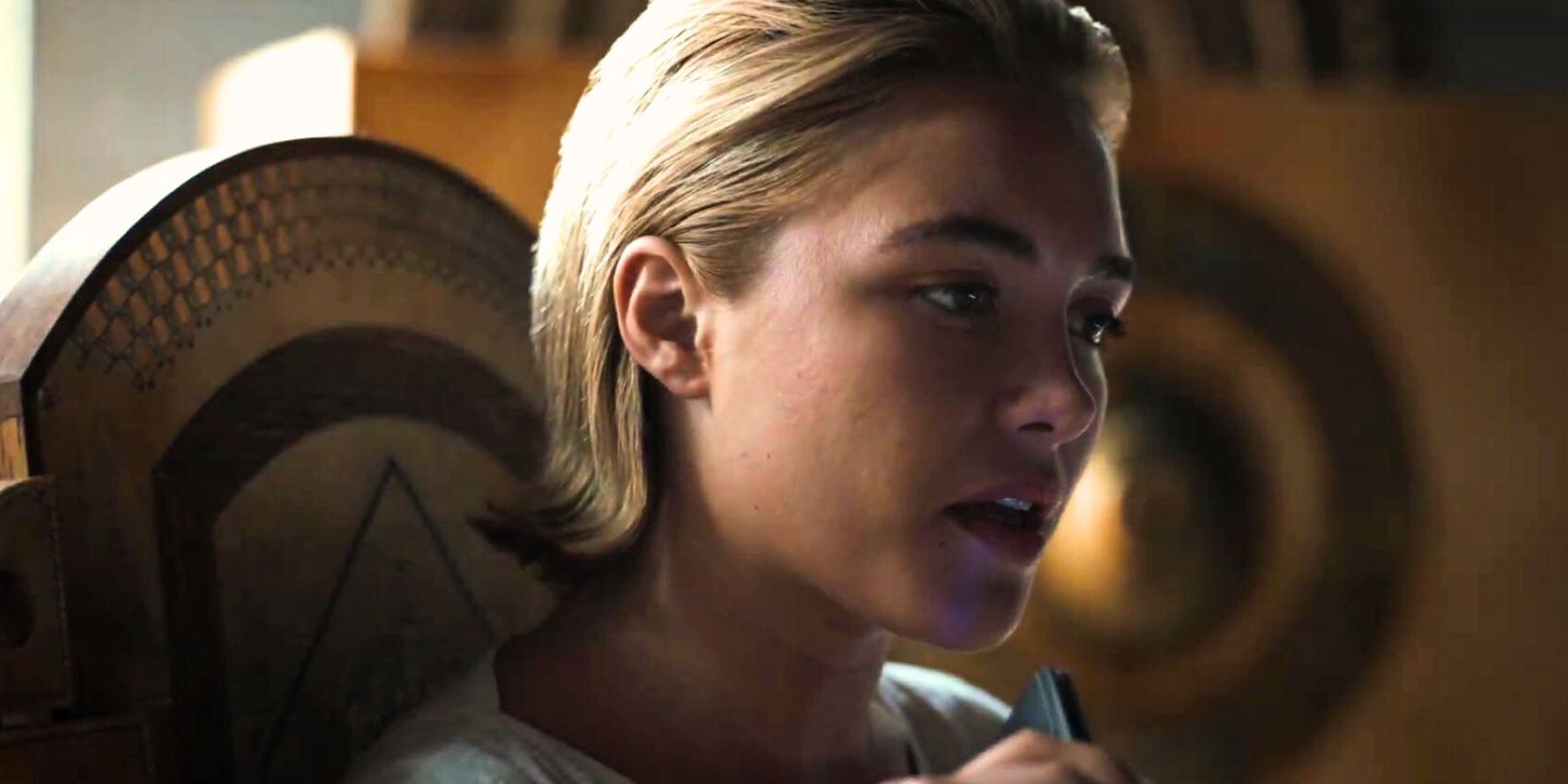 Florence Pugh as Princess Irulan in Dune 2, talking on throne