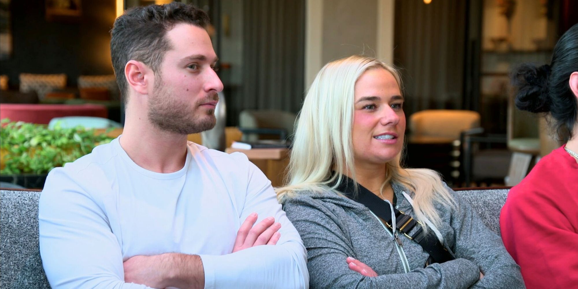 Emily and Brennan Married At first Sight season 17 sitting next to eachother with arms crossed - Emily Was Hurt By Brennan's Actions