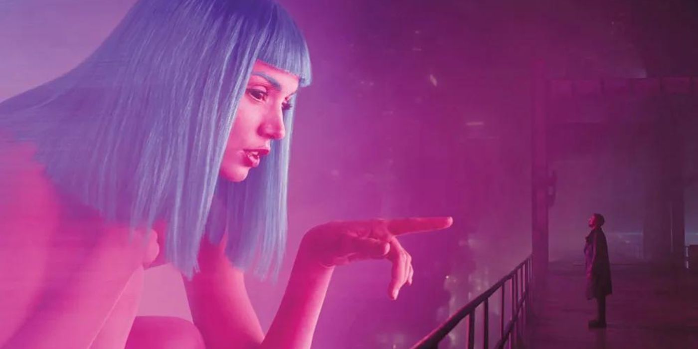 Joi (Ana De Armas) hologram looking down at K (Ryan Gosling) Blade Runner 2049.