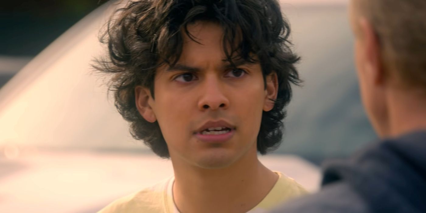 Xolo Maridueña as Miguel Diaz speaks to someone in Cobra Kai. - Miguel Has Taken A Back Seat In The Second Half Of Cobra Kai