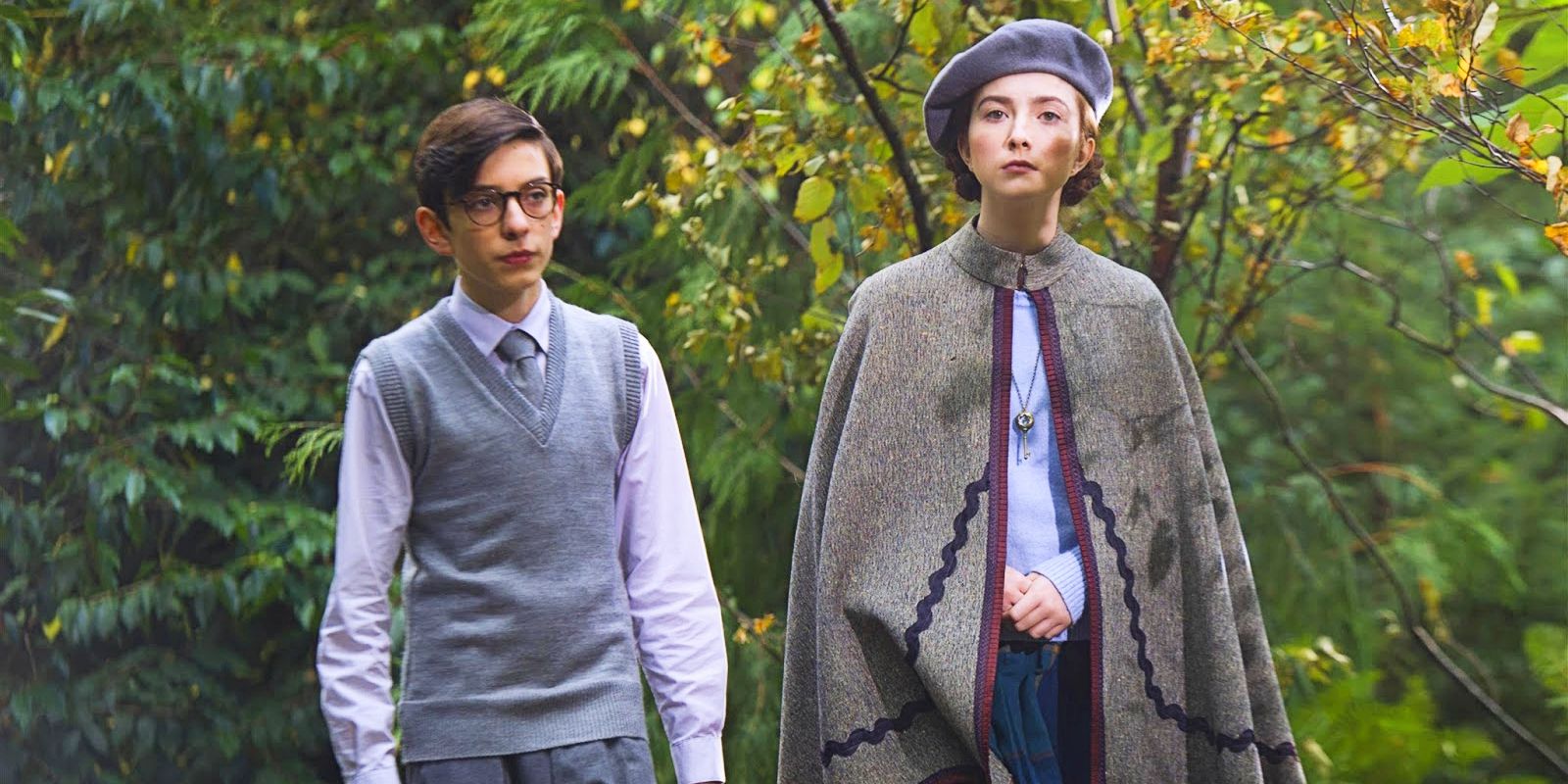 Young Jane and young Martin walk through Fillory in The Magicians.