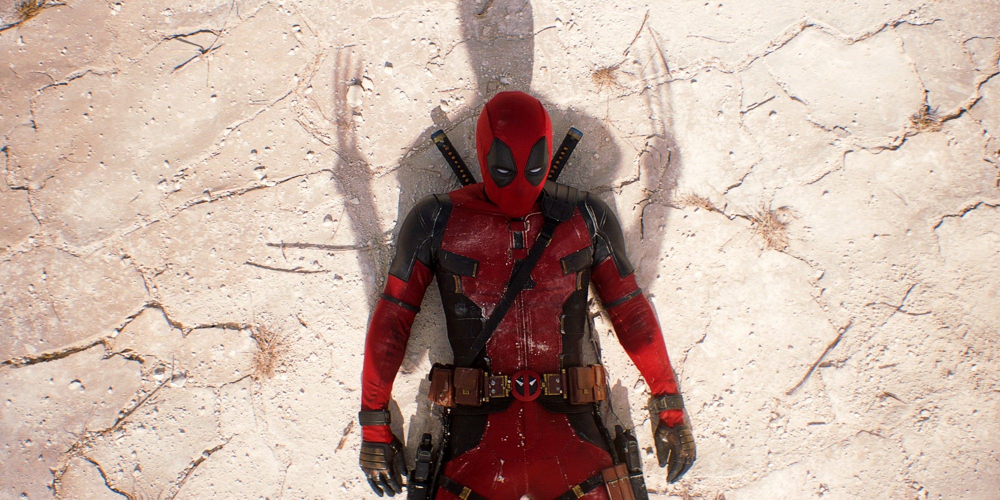 Ryan Reynolds como Deadpool deitado em solo seco coberto pela sombra de Wolverine e suas garras em Deadpool e Wolverine